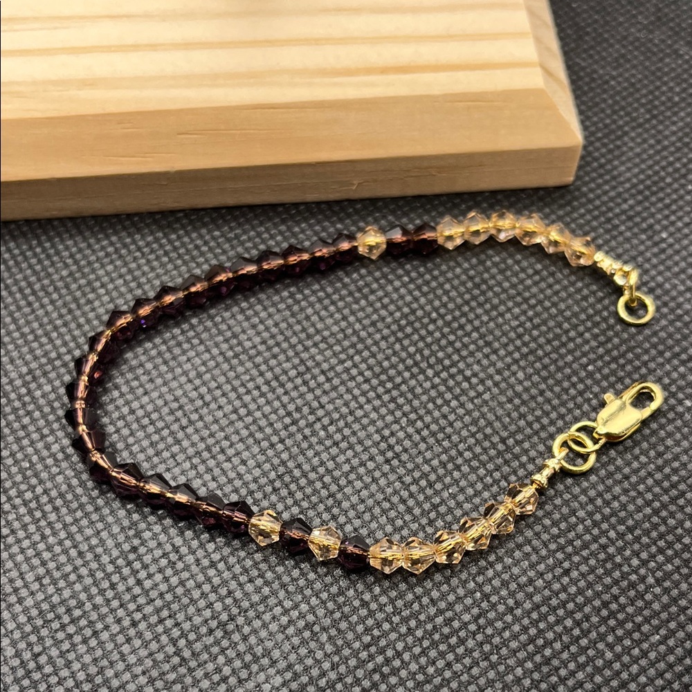 Gold-Tone Bracelet with Purple and Champagne Crystal Beads
